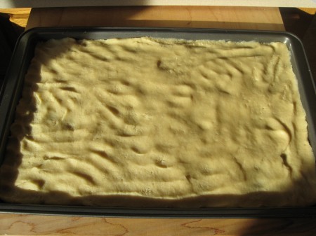 Dough pressed into pan
