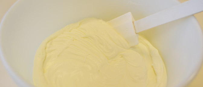 Frosting in Bowl with Spatula