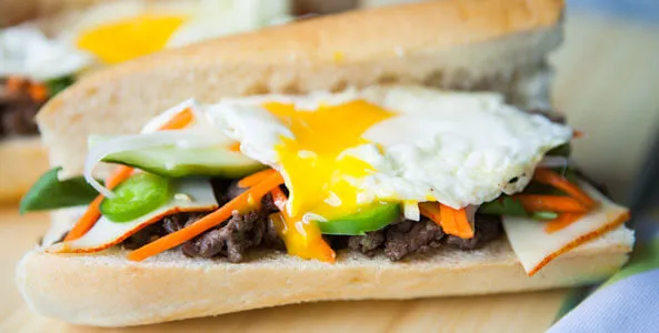 Beef Banh Mi Sandwich with Fried Egg on Top