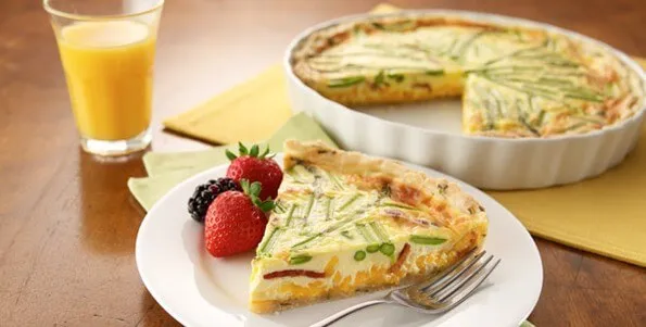 Quiche on a plate with strawberries